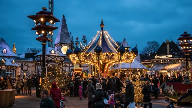 A lively Copenhagen Christmas market at dusk, with a brightly lit carousel and festive stalls. People stroll amongst decorated trees, enjoying the magical atmosphere.